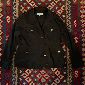 NWOT Very stylish Jacket pocket top and bottom has a draw string inside.